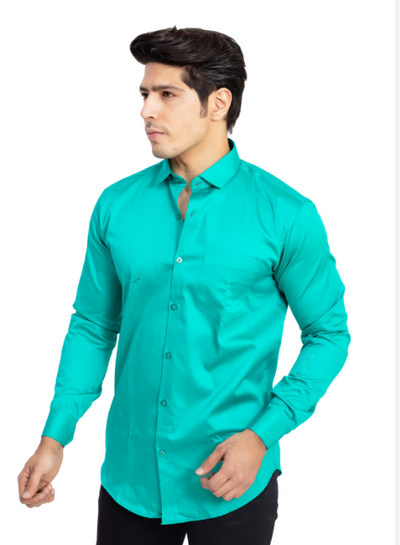 Man wearing a teal shirt on a white background